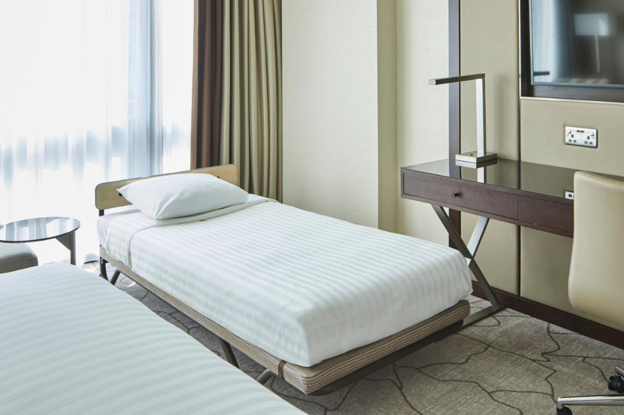 London Marriott Hotel Canary Wharf Εξωτερικό φωτογραφία A single bed